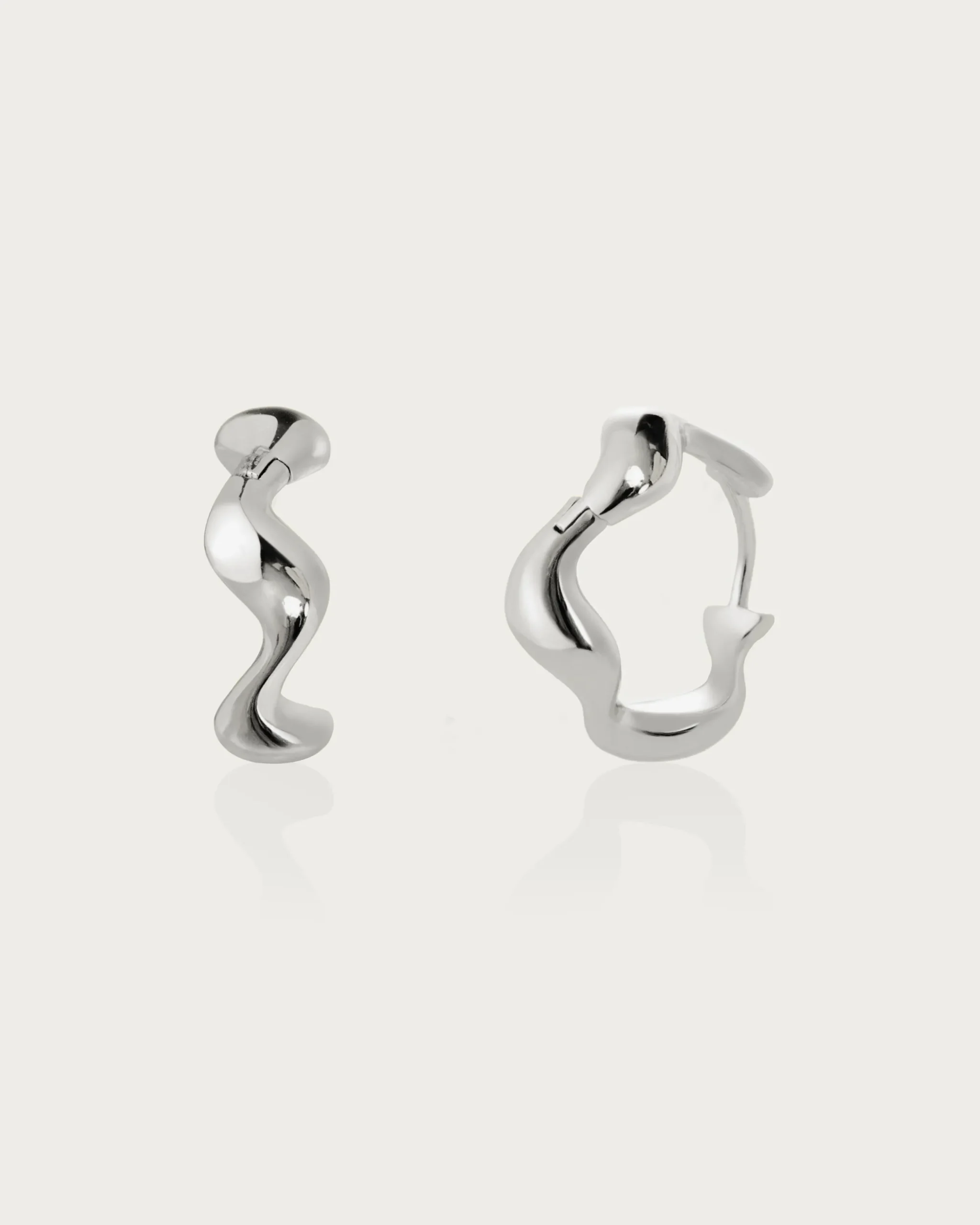 Boucles d'Oreilles Créoles Ondulées Dorées