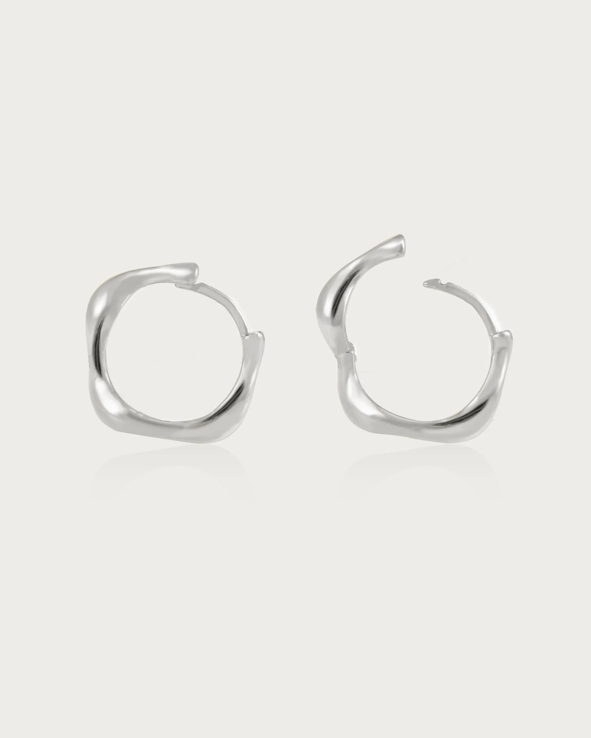 Boucles d'Oreilles Créoles Ondulées Dorées